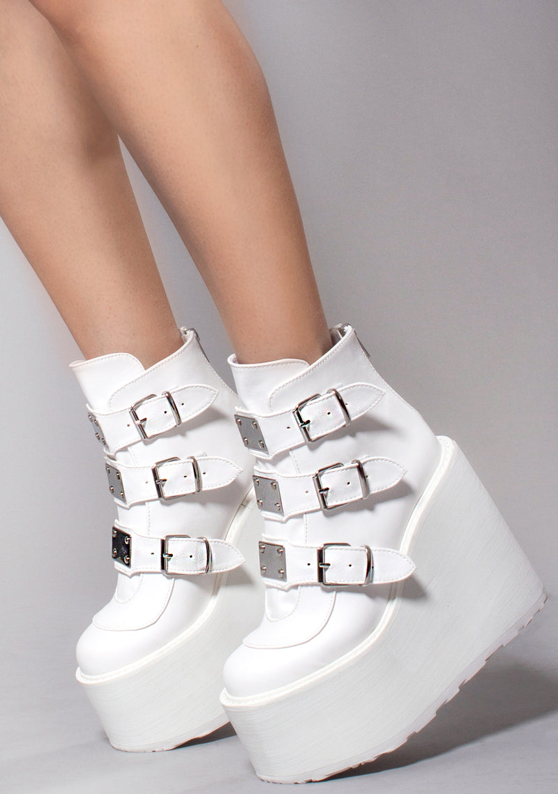 Demonia Swing Strapped Platform Boots in White