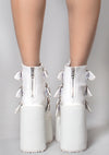 Demonia Swing Strapped Platform Boots in White